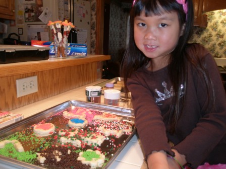 Kasen with her Santa cookies
